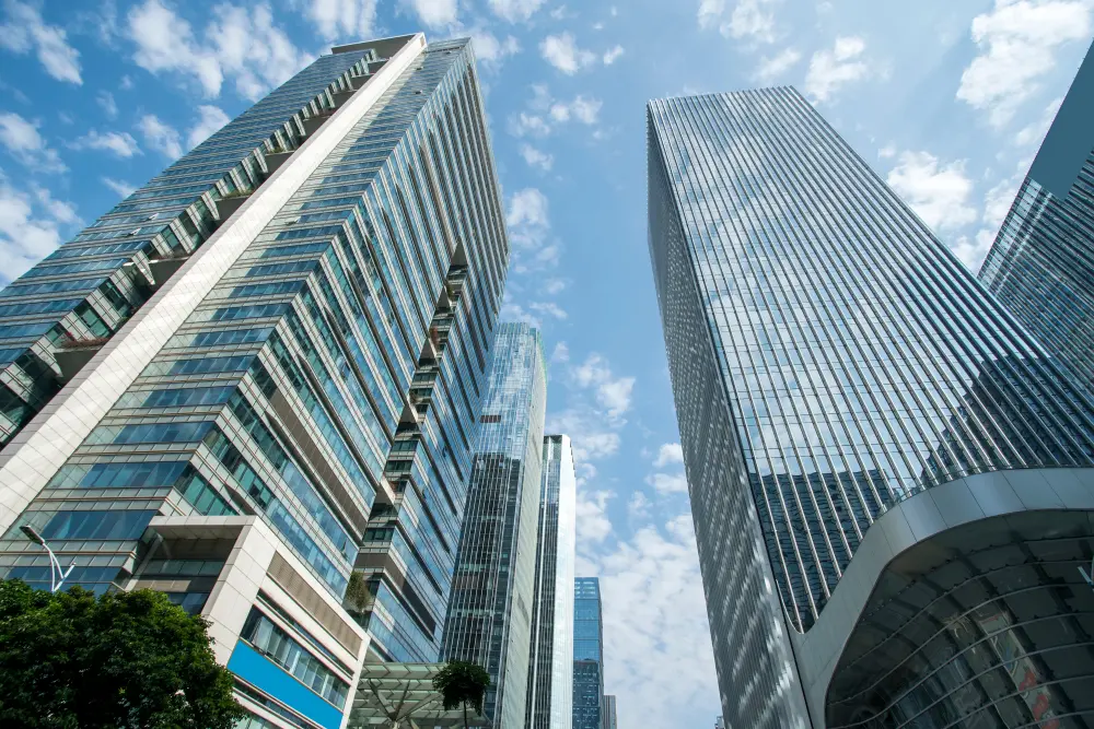 Modern commercial buildings and skyscrapers illustrating property insurance coverage.
