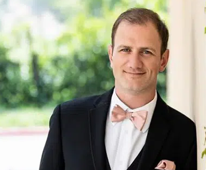 Josh Florance, CRE Insurance agent and broker, smiling portrait.